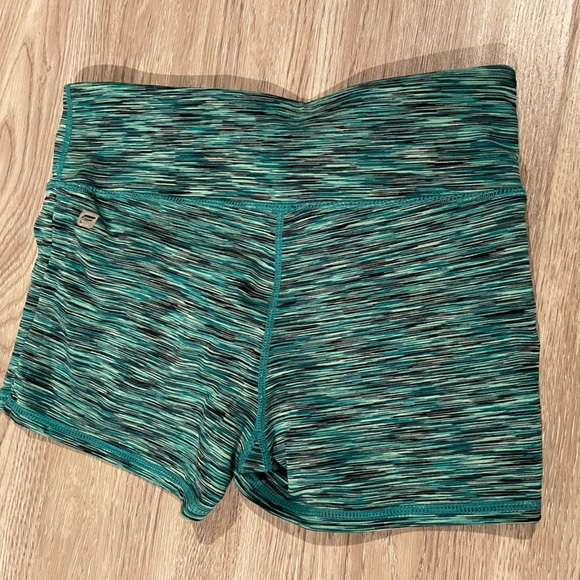 Fabletics teal-blue bike shorts with pocket & pink top with built in sports bra - Picture 2 of 8